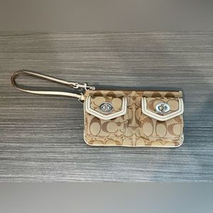 Coach canvas with leather trim wristlet.